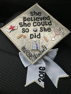 a graduation cap that says she beliveed she could so she did with it