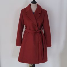 Beautiful Wool Blend Coat By Gap In A Gorgeous Rust Shade. It Has 2 Snap Buttons Inside To Keep It Closed And A Matching Belt On The Outside. It Can Be Snapped Or Left Unsnapped To Adjust It Where You Feel Comfortable. It Is A Gap Maternity Coat But Can Be Worn By Anyone. It Is Currently Selling On-Line For 198.00. Please Refer To Measurements. The Length Is About 38". It Is New With A Ticket. Gap Outerwear For Fall, Gap Outerwear For Fall Workwear, Chic Long Sleeve Gap Outerwear, Chic Gap Outerwear For Spring, Fitted Gap Outerwear For Work, Chic Gap Spring Outerwear, Chic Spring Outerwear By Gap, Chic Gap Outerwear For Winter, Chic Gap Winter Outerwear