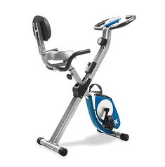 an exercise bike is shown with the seat up and back on it's wheels