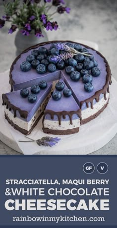 a white chocolate cheesecake with blueberries on top and the words stracciatella, maqui berry & white chocolate cheese cake below