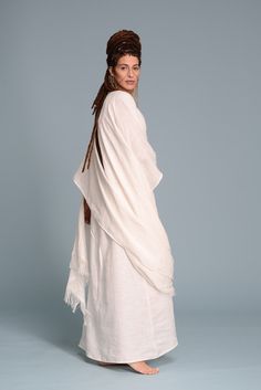 🌿 ITEM DESCRIPTION White linen BOHO cover-up for a special occasion. Extra-long and wide, with handmade fringe. - 100% natural coarse linen - washed and softened - Color WHITE or NATURAL FLAX 🌿 SIZING - One size. Length about 53″/135cm OR CUSTOM The model is 5'9'' (174cm) Wear this beautiful cover-up with linen dress TANIA for very special events: https://etsy.me/2VleoXk 🌿 DELIVERY Each item is individually cut and sewn by order, please allow approx. 1-2 weeks for your order to be made. Thank White Bohemian Shawl For Spring, Bohemian Cream Kaftan For Weddings, Cream Bohemian Wrap Shawl, Bohemian Cream Shawl Wrap, Elegant White Kimono For Festival, Bohemian White Wraps For Wedding, Bohemian Linen Shawl, Long Linen Skirt, White Poncho