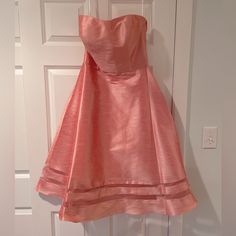 Alfred Sung Strapless Dress, Coral, Size 10. Never Worn, Brand New Condition With Tags Attached. Spring A-line Strapless Dress, Lined, Summer Evening Strapless A-line Dress, Summer Evening A-line Strapless Dress, Summer Strapless Mini Evening Dress, Strapless Mini Evening Dress For Summer, Summer Mini Strapless Dress For Evening, Strapless Evening Dresses For Summer, Strapless Spring Dress For Formal Occasions, Strapless Dress For Spring Formal