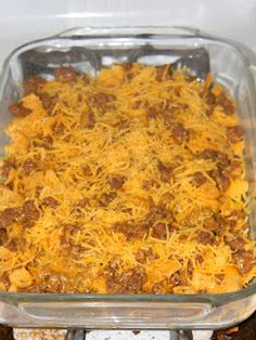 a casserole dish with meat and cheese in it