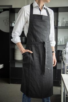 Stylish, adjustable length linen apron for man. Natural and comfortable men's aprons are made with large comfy pockets + loop for easy hanging. Great for daily use. Perfect as a gift!* length: 44" / 112 cm* width: 26" / 66 cmModel, Lukas is 75" / 190cm tall, wears black linen apron* find more aprons and kitchen linens here:https://www.etsy.com/shop/LovelyHomeIdea?section_id=18945683* safe Oeko-TEX® Standard 100 certified linen fabric.* designed and carefully handmade by Lovely Home Idea in small Apron Outfit Men, Apron For Cooking, Man In Apron Drawing, Waiter Outfit Men, Cooking Aprons For Men, Chef Outfit Men, Men Aprons Ideas, Barista Outfit Men, Guy In Apron