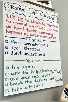 a bulletin board hanging on the wall next to a clock with words written on it