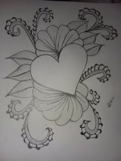 a drawing of a heart with flowers on it