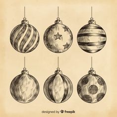 hand drawn christmas ornaments hanging on strings