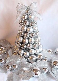 a christmas tree made out of silver balls