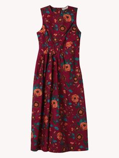 The Davina Dress is beautifully structured from cotton poplin with artful pintucks at the waist that defines the form. This sleeveless dress arrives in our seasonal floral print with blooms in blue, burgundy, and orange. It has a round neckline, side pockets, and fastens with a zipper at the back. Composition: 100% Cotton Burgundy And Orange, Heel Accessories, Tanya Taylor, Denim Flares, Knit Shirt, Ulla Johnson, Denim Pant, Blazer Coat, Cotton Poplin