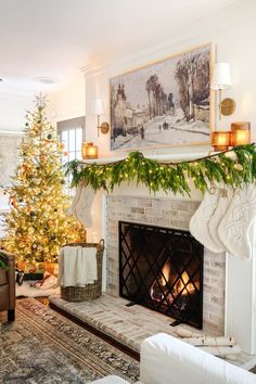 a living room with a christmas tree and fireplace