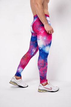 Description: Pink & Blue Galaxy Print Men's Leggings Breathable & Moisture Wicking 4-Way Stretch Fabric Machine Wash Cold, Quick Drying High Stretch Spandex / Polyester Bolt Logo Patch This design does not have pockets Model is 6’2’’ (189cm) tall, 34’’ (86cm) waist and wears size Large. Aerobic Outfits, Bolt Logo, Acid Jazz, Galaxy Leggings, Blue Galaxy, Mens Leggings, Galaxy Print, Compression Shorts, White Texture