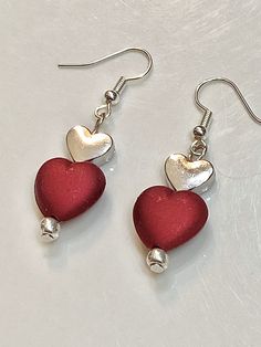 Double heart earrings. Heart Detail Double Heart Earrings For Gift, Gift Double Heart Detail Earrings, Heart-shaped Earrings With Heart Detail As Gift, Silver Double Heart Bead Earrings, Silver Double Heart Earrings With Heart Beads, Heart-shaped Earrings With Heart Beads For Valentine's Day, Double Heart Beads Earrings For Valentine's Day, Heart Beads Double Heart Earrings For Valentine's Day, Double Heart Beaded Earrings For Valentine's Day