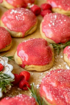 strawberry shortbread cookies with powdered sugar and sprinkles