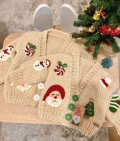 knitted christmas sweaters with santa and snowmen on them