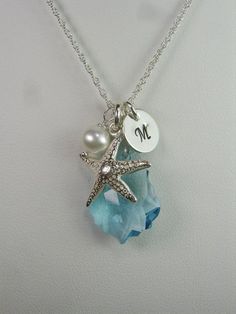 . Ocean-inspired Silver Jewelry For Wedding, Starfish-shaped Necklace With Pearl Charm For Gift, Ocean-inspired Sterling Silver Jewelry For Wedding, Ocean-inspired Sterling Silver Jewelry For Weddings, Silver Jewelry With Pearl Charm For Beach, Beach Jewelry With Silver Pearl Charm, Silver Beach Jewelry With Pearl Charm, Beach Jewelry: Silver With Pearl Charm, Beach Silver Jewelry With Pearl Charm