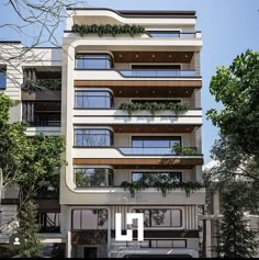 an apartment building with many balconies and plants growing on the balconyes above it