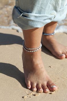 "Flaunting a dreamy gray finish, these chunky gray pearls strung along this adjustable beaded anklet have been emphasized with gold-filled accents for a sizzling tropical twist. ✦ DETAILS ✦ ✧ Name: Maile (MIE-leh) - vine. ✧ Adjustable Length up to 10\" Inches. ✧ Natural Gray Freshwater Pearls. ✧ 14kt Gold Filled Components, Extender, and Clasp. ✧ All Ke Aloha Jewelry pieces come packaged thoughtfully, beautifully, and ready for gift giving. ✦ Sign up here for Special Discounts and Promotions: ht Adjustable Silver Pearl Anklets, Beaded Silver Ankle Wrap Anklet, Adjustable Beaded Pearl Anklets, Silver Beaded Ankle Wrap Anklet, Hawaii Gift, Peacock Pearls, Hawaii Jewelry, Chunky Pearls, Summer Anklets