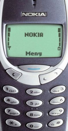 an old nokia cell phone with the message'nokia meny'written on it