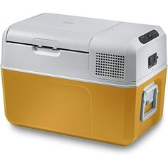 a yellow and white cooler sitting on top of a table