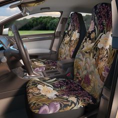 the interior of a car with floral seat covers