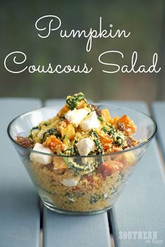 a glass bowl filled with food on top of a table