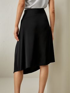 Elevate your wardrobe with this versatile and chic asymmetric silk skirt. Perfect for office or casual wear, featuring pleated detailing and an elegant hemline design. Stand out in style with this summer essential! Design Stand, Summer Essential, Taffy, Silk Skirt, Summer Essentials, This Summer, In Style, Casual Wear, Silk