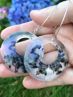 "Handmade Resin Earrings with Real Lavender Flowers.  Choose your shape and hoop size.  More styles coming up Shape Sizes: Small Diamond - 35mm x 25mm (1.4\" x 1\") Large Square - 40mm x 40mm (1.6\" x 1.6\") Circle Diameter - 40mm (1.6\") Hoop Sizes: Small - 15mm (0.6\") Medium - 25mm (1\") Large - 35mm (1.4\")" Nature-inspired Hoop Earrings As Gift, Nature-inspired Round Hoop Earrings For Gift, Handmade Small Hoop Earrings Nature-inspired, Handmade Small Hoop Nature-inspired Earrings, Handmade Small Hoop Earrings, Nature-inspired, Handmade Small Nature-inspired Hoop Earrings, Handmade Clear Small Hoop Earrings, Handmade Small Hoop Clear Earrings, Handmade Nature-inspired Hoop Earrings Gift