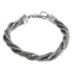 Incorporating ancient Balinese designs this sterling silver bracelet makes a beautiful gift for both men and women. Innovative yet traditional its braided seduction lends a graceful accent to the contemporary wardrobe. .925 Sterling silver Artisan Sterling Silver Jewelry With Jubilee Bracelet, Elegant Engraved Braided Bangle Bracelet, Classic Adjustable Bracelet With Intricate Design, Traditional Engraved Sterling Silver Braided Bracelets, Elegant Adjustable Sterling Silver Bracelet With Oxidized Finish, Traditional Engraved Sterling Silver Braided Bracelet, Elegant Bracelets With Interwoven Design As Gift, Elegant Bracelets With Interwoven Design For Gift, Classic Adjustable Sterling Silver Bracelet With Intricate Design