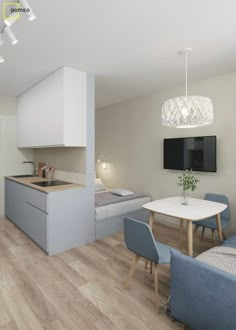 a kitchen and living room are shown in this 3d image with white walls, light wood flooring, and blue chairs