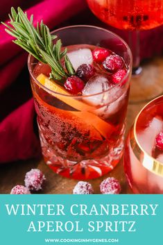 winter cranberry aperoli spritz cocktail with rosemary garnish