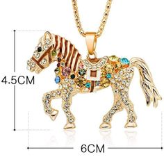 Our amazing boutique sweater necklace is so much more stunning in person. The lovely long gold chain adds to the statement that this multi-colored crystal horse pendant brings. This piece is AMAZING! Blazing Saddles, Horse Bracelet, Horse Fashion, Horse Accessories, Horse Necklace, Horse Jewelry, Horses Pendant, Buy Crystals, Long Chain Necklace