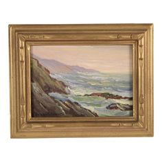 an oil painting of the ocean with waves crashing in to land and rocks on the shore