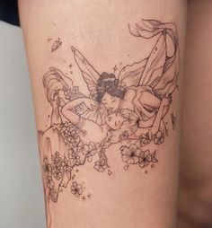 a woman with a tattoo on her thigh