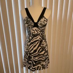 Brand: Rue21 Size: Small Style: Animal Print Strap Dress Details: Shiny Material: 92% Polyester And 8% Spandex Color: Black, White, And Silver Condition: New Without Tags Care: Hand Wash Cold Water Country Of Origin: Made In Usa Sleeveless Zebra Print Dress For Night Out, Fitted Zebra Print Beach Dress, Black Zebra Print V-neck Dress, Elegant Sleeveless Dress With Zebra Print, Fitted Black Zebra Print Dress, Black V-neck Dress With Zebra Print, Fitted Black Dress With Zebra Print, Plum Lace Dress, White Lace Summer Dress