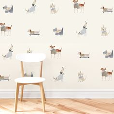 there is a wall with dogs on it in this room, and the walls are painted white