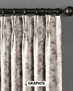 a curtain with the word graphite on it and an image of a flower pattern