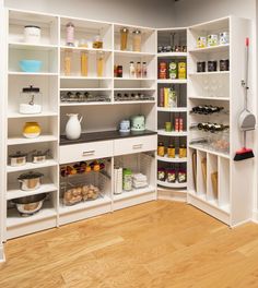 an organized pantry with lots of food in it