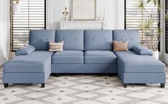 a blue sectional sofa in a living room