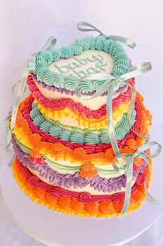 there is a cake that has been decorated with ribbons