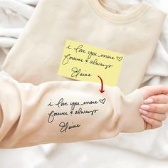 ❤️ WELCOME TO OUR STORE! This customized sweatshirt features actual handwriting embroidery, allowing for a personalized touch that makes it the perfect gift for couples or loved ones. Made with high-quality materials, this hoodie is perfect for matching or as a unique Christmas gift for her. 🎉 CUSTOMIZED CONTENT - After placing the order, please send us the photo of your pet, your family, your loved ones or just your favorite photos directly in the Etsy Message or to our email: support@personalizy.com. I'll do everything to make it look perfect on the shirt 🥰 - These photos can be cherished memories, joyful moments, or special scenes, making them unique embroidered patterns on the shirt. 🎉 PROCESSING AND SHIPPING TIME - Package arrives in 5-10 business days  🎉 PRODUCT AND BRAND DETAILS Personalized Long Sleeve Hoodie For Gift, Gift Sweatshirt With Embroidered Text And Long Sleeves, Custom Text Long Sleeve Sweatshirt As A Gift, Personalized Casual Long Sleeve Sweatshirt, Long Sleeve Hoodie With Letter Print For Gift, Customizable Winter Gift Sweatshirt, Long Sleeve Letter Print Sweatshirt Gift, Long Sleeve Letter Print Sweatshirt For Gift, Letter Print Long Sleeve Sweatshirt For Gift