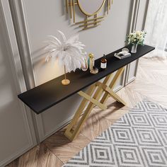 a black table with some white flowers on it and a mirror in the corner behind it