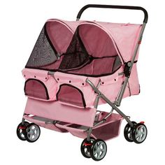 a pink dog stroller with two dogs in it's side by side, on wheels