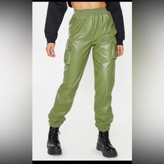 Give Your Look A Serious Edge With These Sweatpants Doll. Featuring A Khaki Faux Leather Material With Pocket Detailing And An Elasticated Waistband, We're Obsessed. Team These With A Cropped Hoodie, Oversized Coat And Lace-Up Boots For A Look We're Loving. Length Approx 77cm/30.5" (Based On A Sample Size Uk 8) Model Wears Size Uk 8/ Eu 36/ Aus 8/ Us 4 Casual Faux Leather Pants With Side Pockets, Casual Faux Leather Cargo Pants, Casual Leather Pants With Side Pockets For Fall, Casual Faux Leather Cargo Pants With Pockets, Casual Leather Pants With Cargo Pockets For Fall, Utility Faux Leather Pants With Pockets, Casual Faux Leather Pants With Faux Pockets, Trendy Faux Leather Cargo Pants With Pockets, Fitted Faux Leather Cargo Pants For Fall