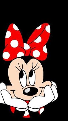 a cartoon character with a red bow on her head and white polka dots around it's neck