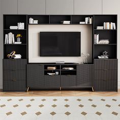 an entertainment center with bookshelves and a television