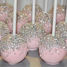 pink cake pops with white and gold sprinkles