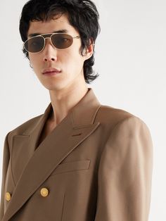 Fendi's 'O'Lock' sunglasses are an architectural take on the classic aviator style. They've been made in Italy from gold-tone metal and accented with the label's 'FF' motif along the arms. Corinthian Sunglasses, Locks Sunglasses, Fendi Collection, Fendi Eyewear, Fendi Sunglasses, Summer Sunglasses, Aviator Style, Metal Sunglasses, Sunglasses For Men