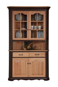 a wooden china cabinet with glass doors on the top and bottom shelves, in front of a white background