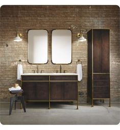 a bathroom with brick wall and two mirrors above the sinks, along with stools