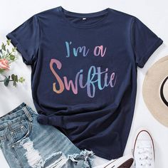 a t - shirt that says i'm on swiffie next to ripped shorts